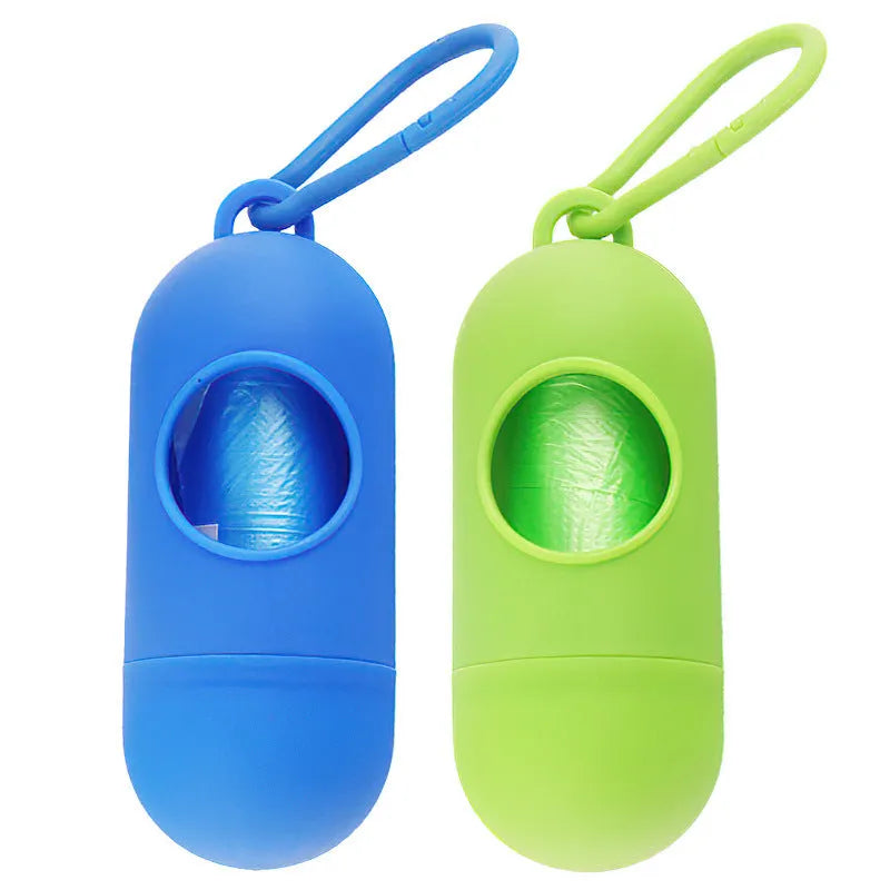 A compact black dog poo bag holder with a side hook and a Velcro strap at the bottom.