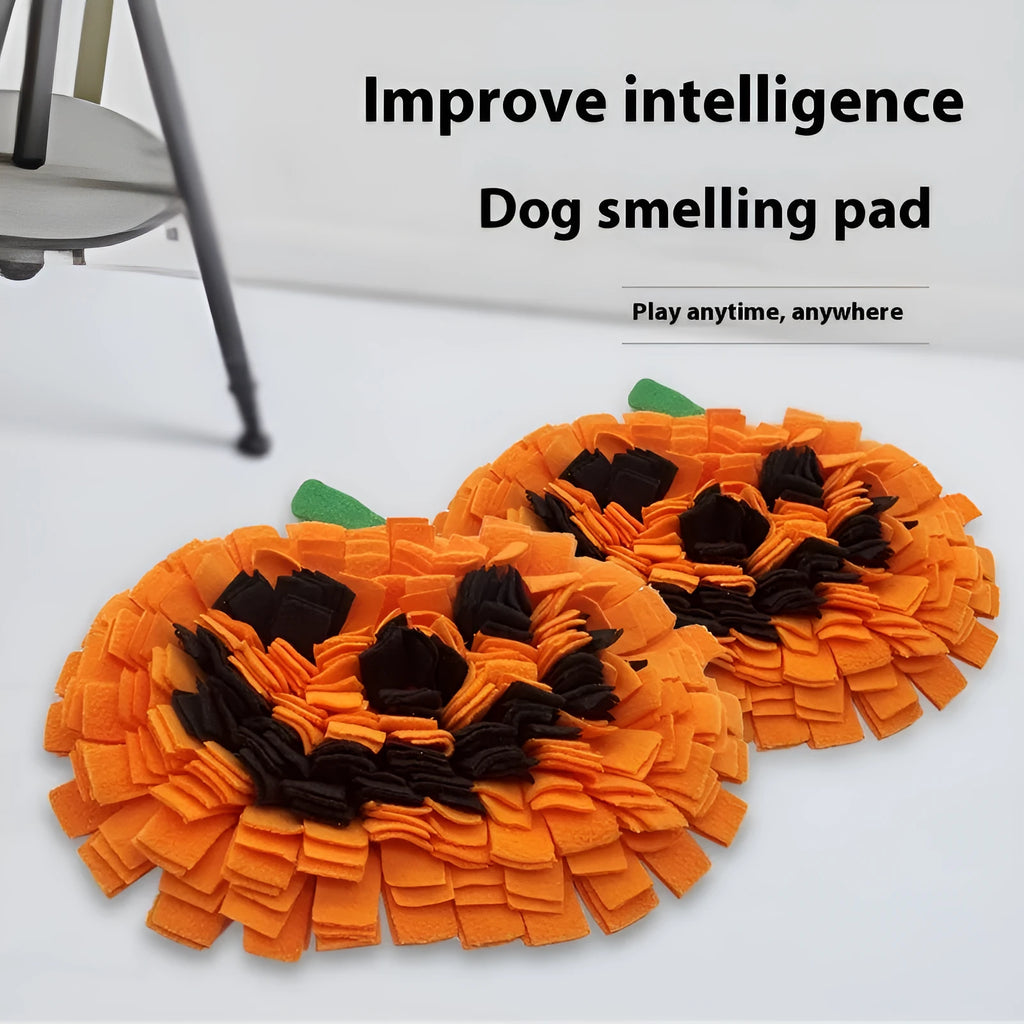 Orange pumpkin-shaped dog smell mat with fabric strips for slow feeding