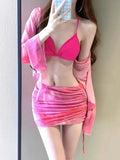 Women's blue four-piece bikini swimsuit set showing shirt, bra, high-waist brief, and skirt for swimming and fitness