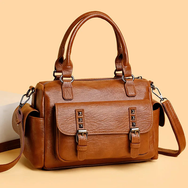 Horizontal square vintage messenger bag in PU leather with contrast stitching, shown in multiple colours.