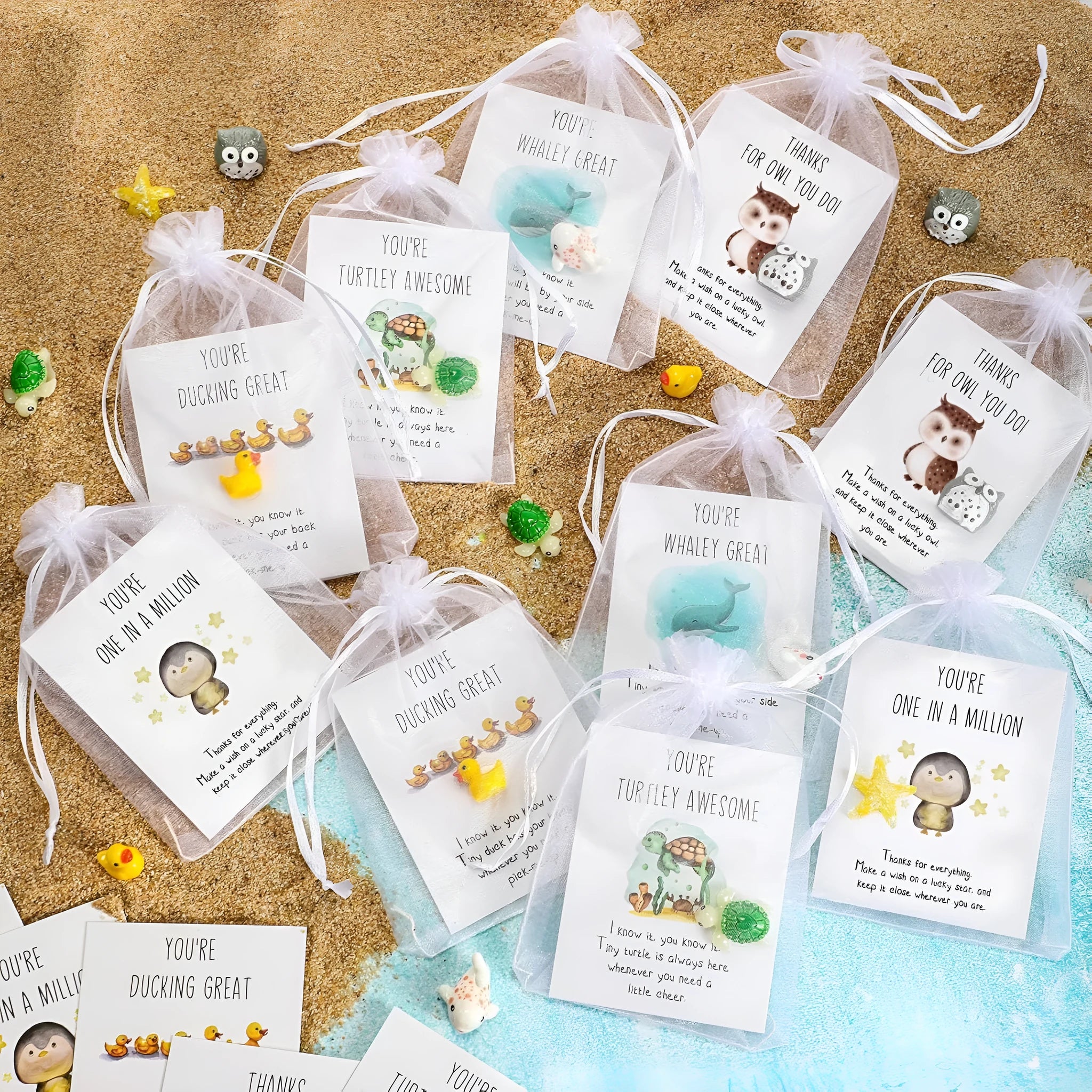 Set of solid resin inspirational cards with pun quotes, shown in a pile on a desk.