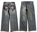 Men's light grey washed-out denim jeans with a wide-leg straight cut and retro workwear style.