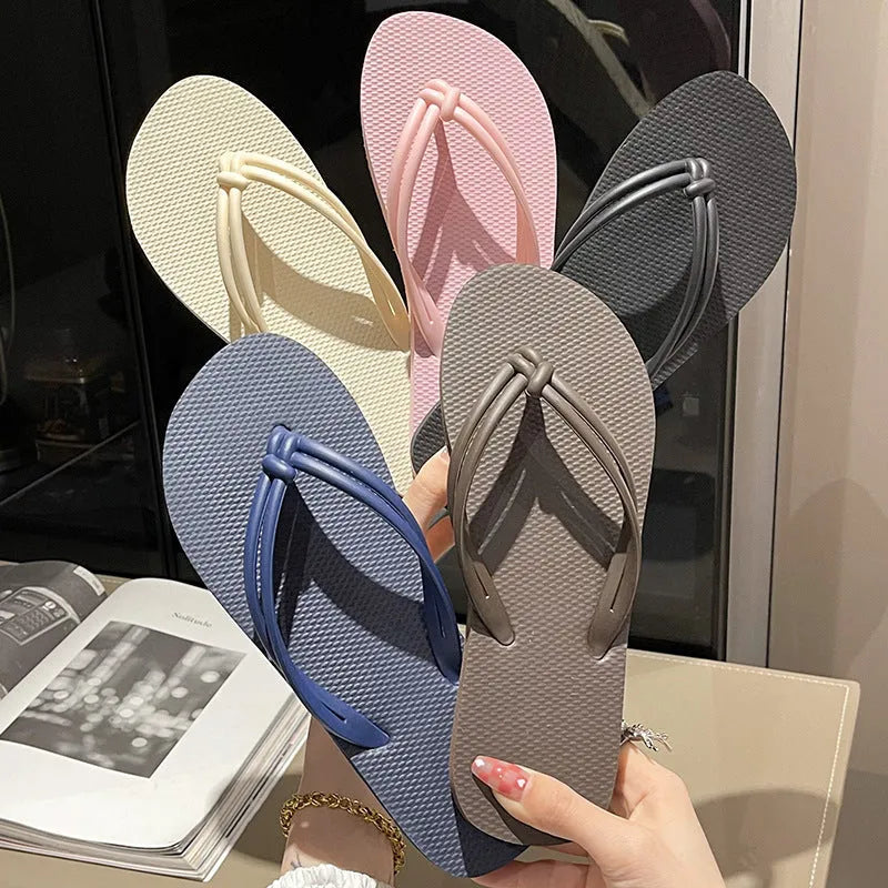 PVC casual flip flops in a toe-covering style on a plain background, showing the one-piece moulded construction.