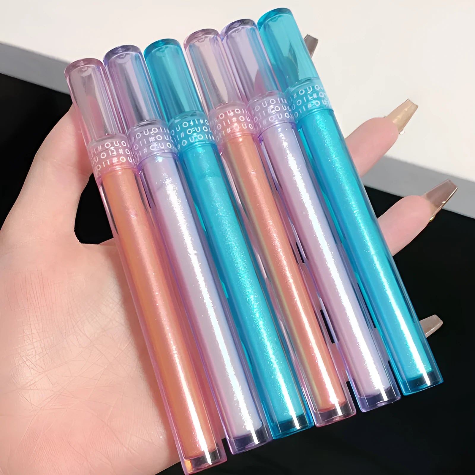 Lying Silkworm Liquid Eye Shadow in Coral Sea shade, 13.6cm tube packaging