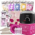 Professional waxing kit with hard wax beans, warmer, application sticks, post-care lotion and cooling masks on pink background