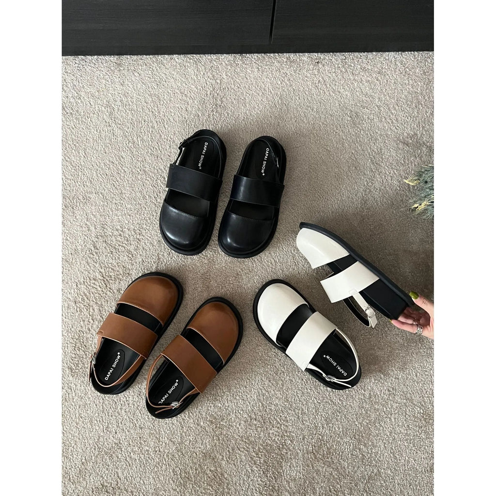 Women's retro sandals with a single ankle strap buckle and closed round toe, shown in apricot colour.