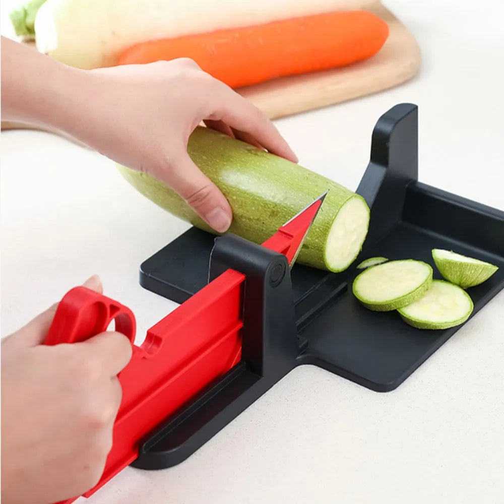 Green multifunctional vegetable cutter on a kitchen counter with stainless steel blade and plastic body