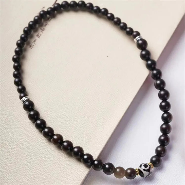 8mm ebony wood two-circle unisex retro bracelet on a white background