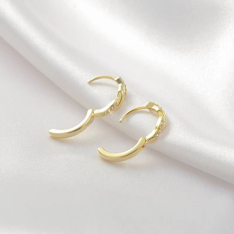 Copper geometric earrings with interwoven hemp rope design in gold and silver finishes