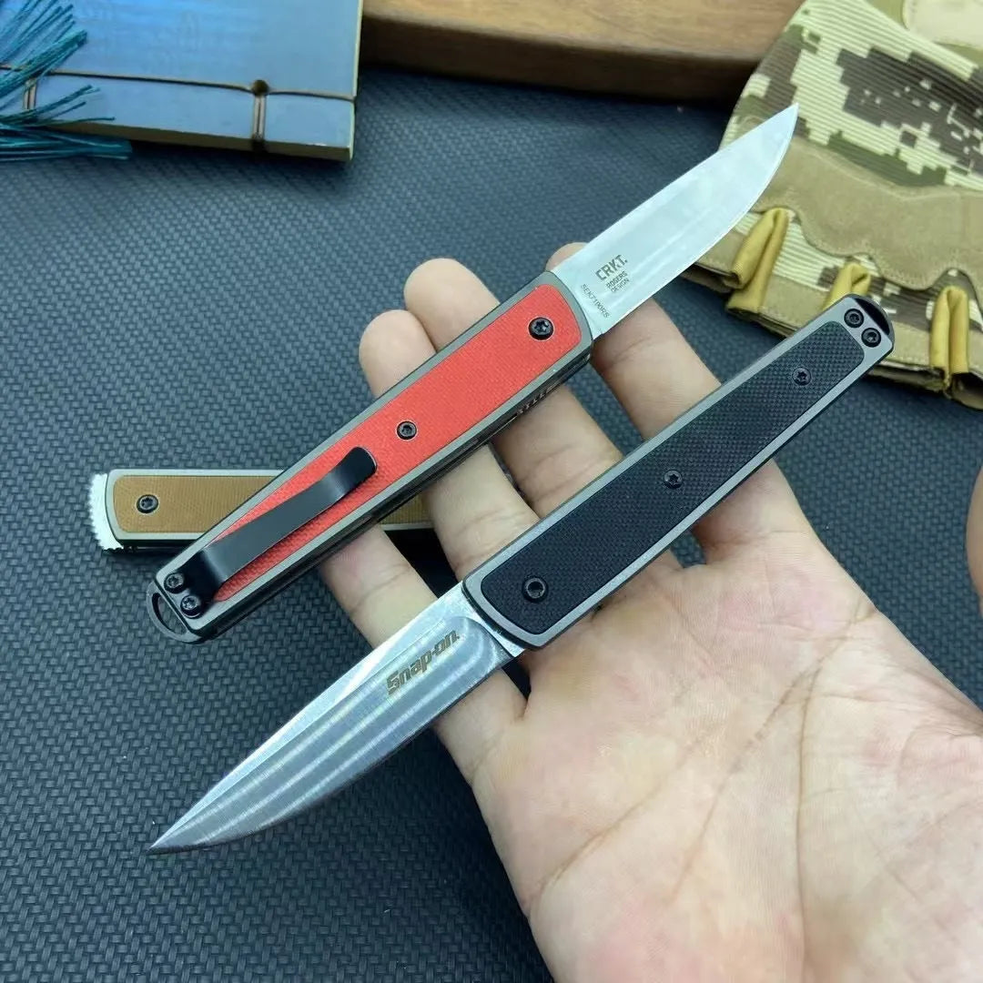 CRKT 7190 folding fruit knife showing blade and handle in choice of black, coffee brown, or red colours