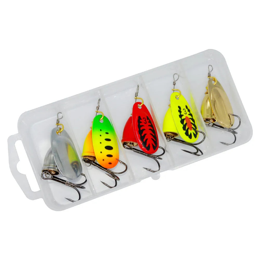 R-shaped metal fishing lure with rotating sequins and a central copper bell in multiple colour options.