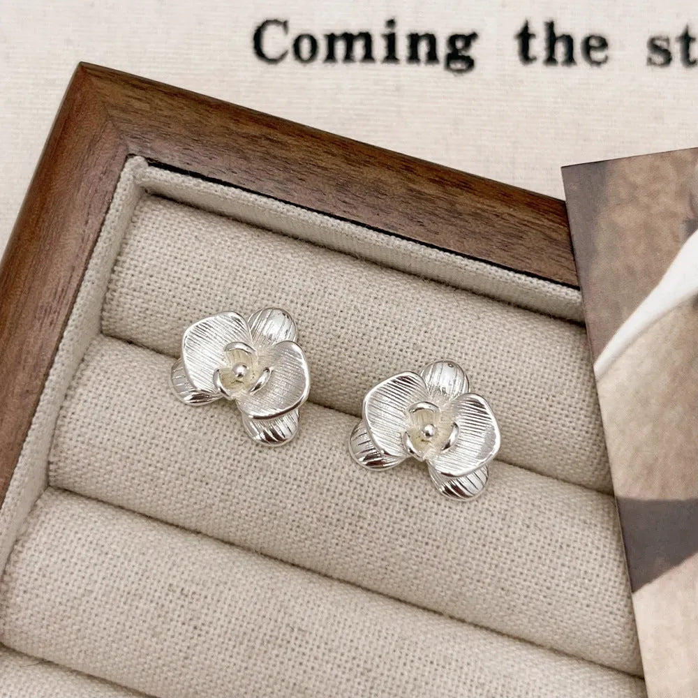 Retro flower earrings for women in gold or silver electroplated copper with petal detailing