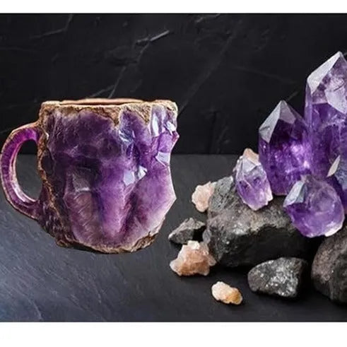 A solid purple resin coffee mug with a handle on a white background.