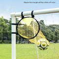 Portable soccer training goal net in black, used for practice shooting drills on grass