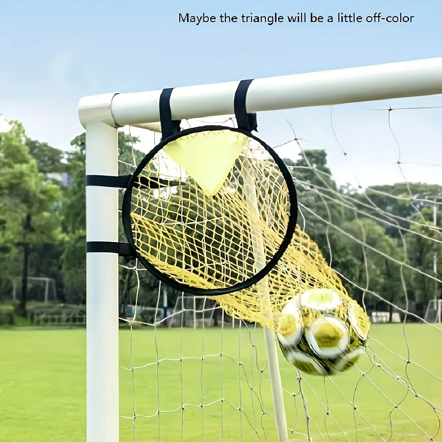 Portable soccer training goal net in black, used for practice shooting drills on grass