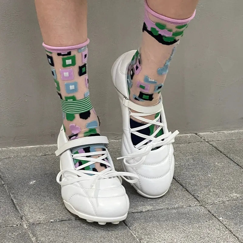 Women's silver lace-up sports shoes with creative bow detail on front, round toe and mid heel