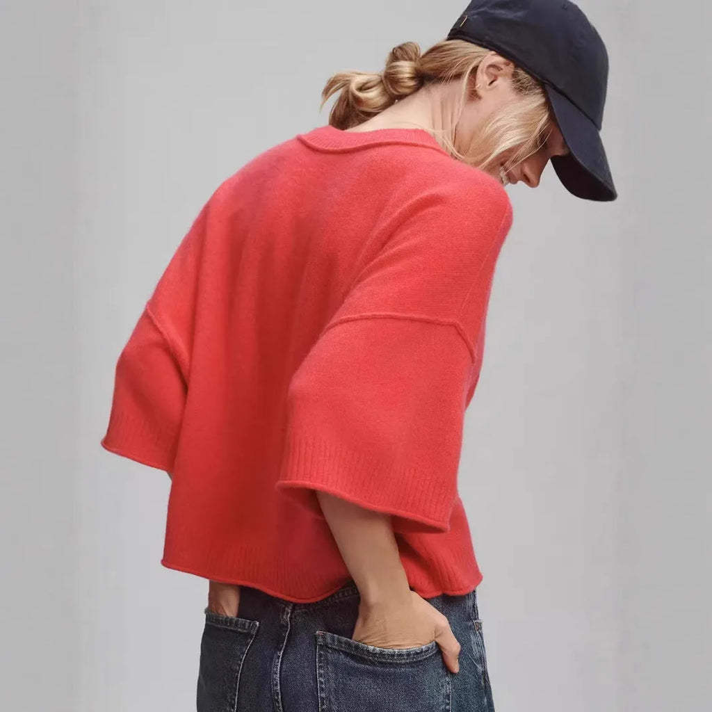 Red short t-shirt on a model showing exposed navel detail, style example for white colour option also available.