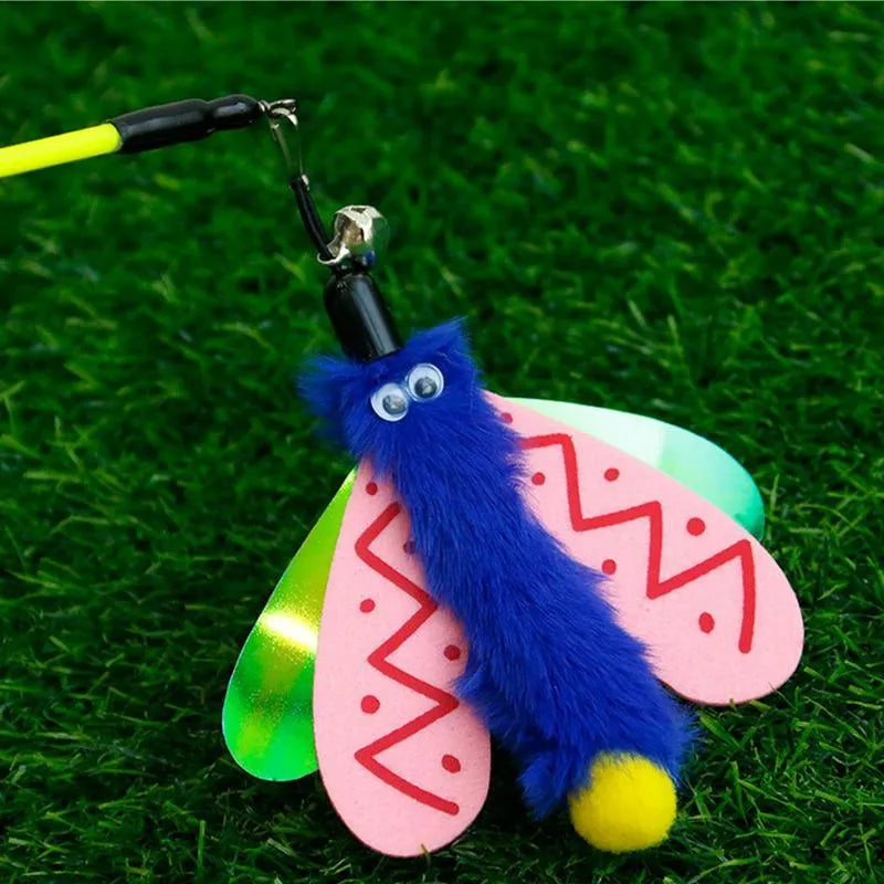 Cat wand toy with bell and dragonfly attachment in green, ABS stick 49cm long, on a light background