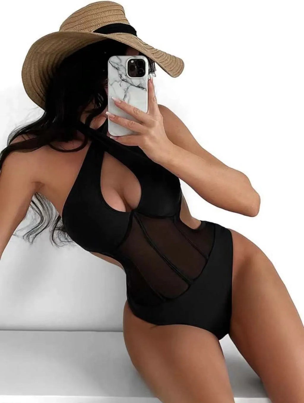 Women's black one-piece spun yarn swimsuit bikini on a mannequin, showing front design.