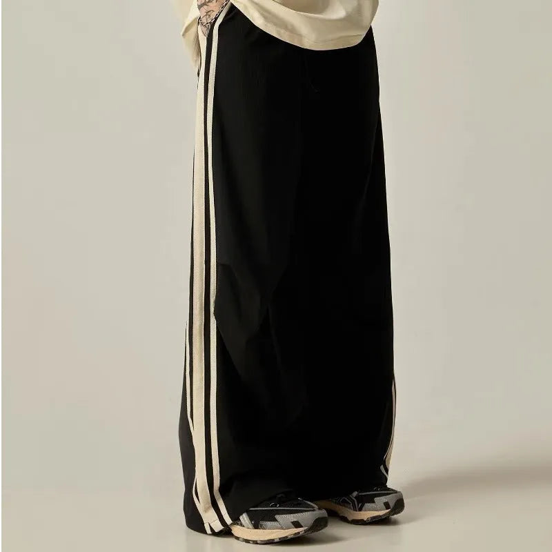 Men's black wide leg climbing pants with high waist and straight-leg design