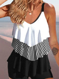 Women's backless bikini swimsuit with spaghetti straps and ruffle trim in solid colour, floral, or gradient patterns