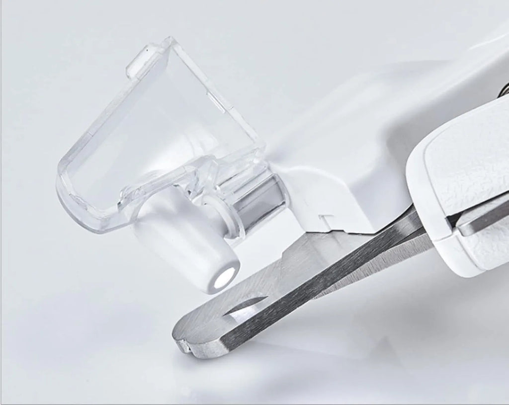White LED pet nail clippers with transparent guard and triangular steel blade for dogs and cats