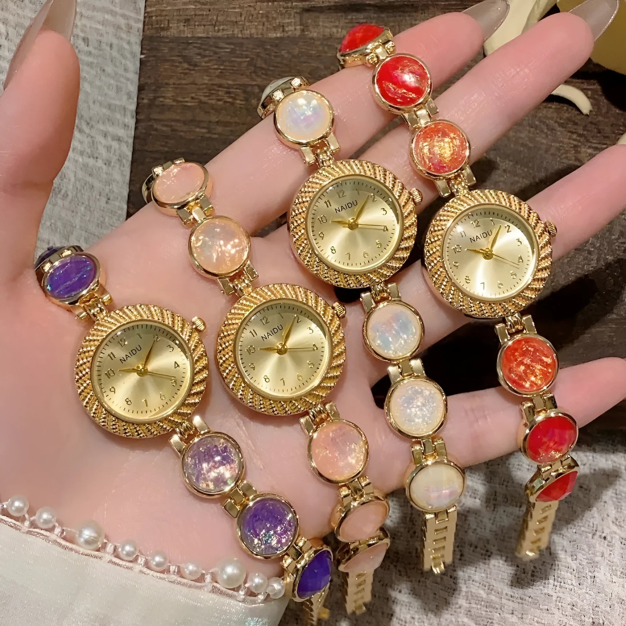 Women's 25mm round quartz watch in zinc alloy case, shown in various colours.