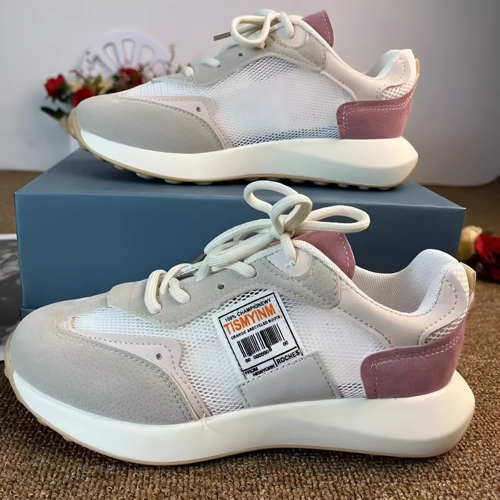 Women's grey and pink retro sneakers with low-top design and round toe