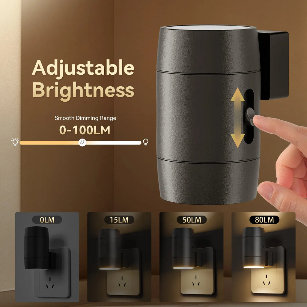 Small white plug-in night lamp with rotatable head showing adjustable brightness control, plugged into wall socket