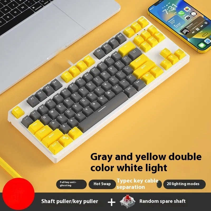 87-key wired mechanical gaming keyboard with colourful keycaps on a metal frame, shown with key puller and cable.