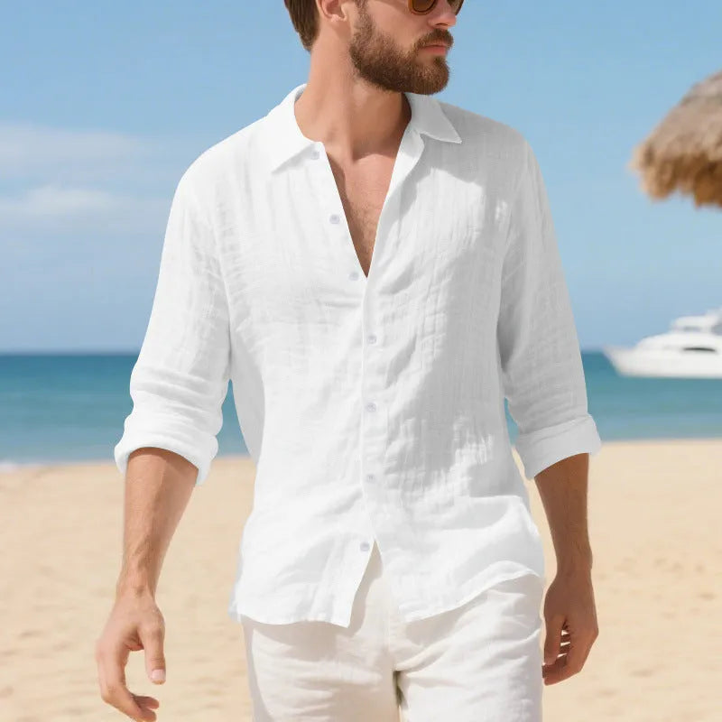 Loose-fitting linen casual shirt in light blue, showing long sleeves and non-ironed texture.