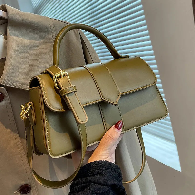 Women's beige messenger bag with horizontal square design showing external pockets and 22cm width