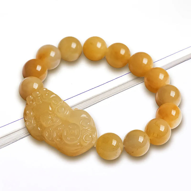 Golden Thread Jinsi Jade carved money bracelet showing pendant and beads, with size option examples.