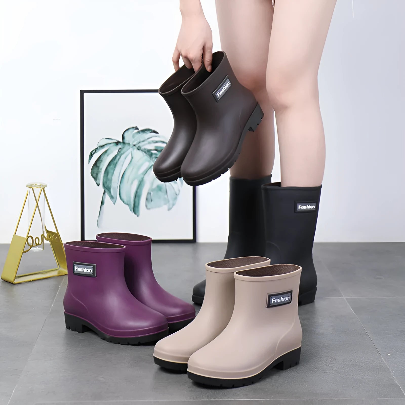 Women's PVC mid-calf rain boots in black with low heel, size 36-40
