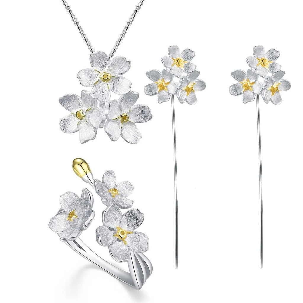 Hand-designed sterling silver Myosotis flower pendant charm with open mouth loop.