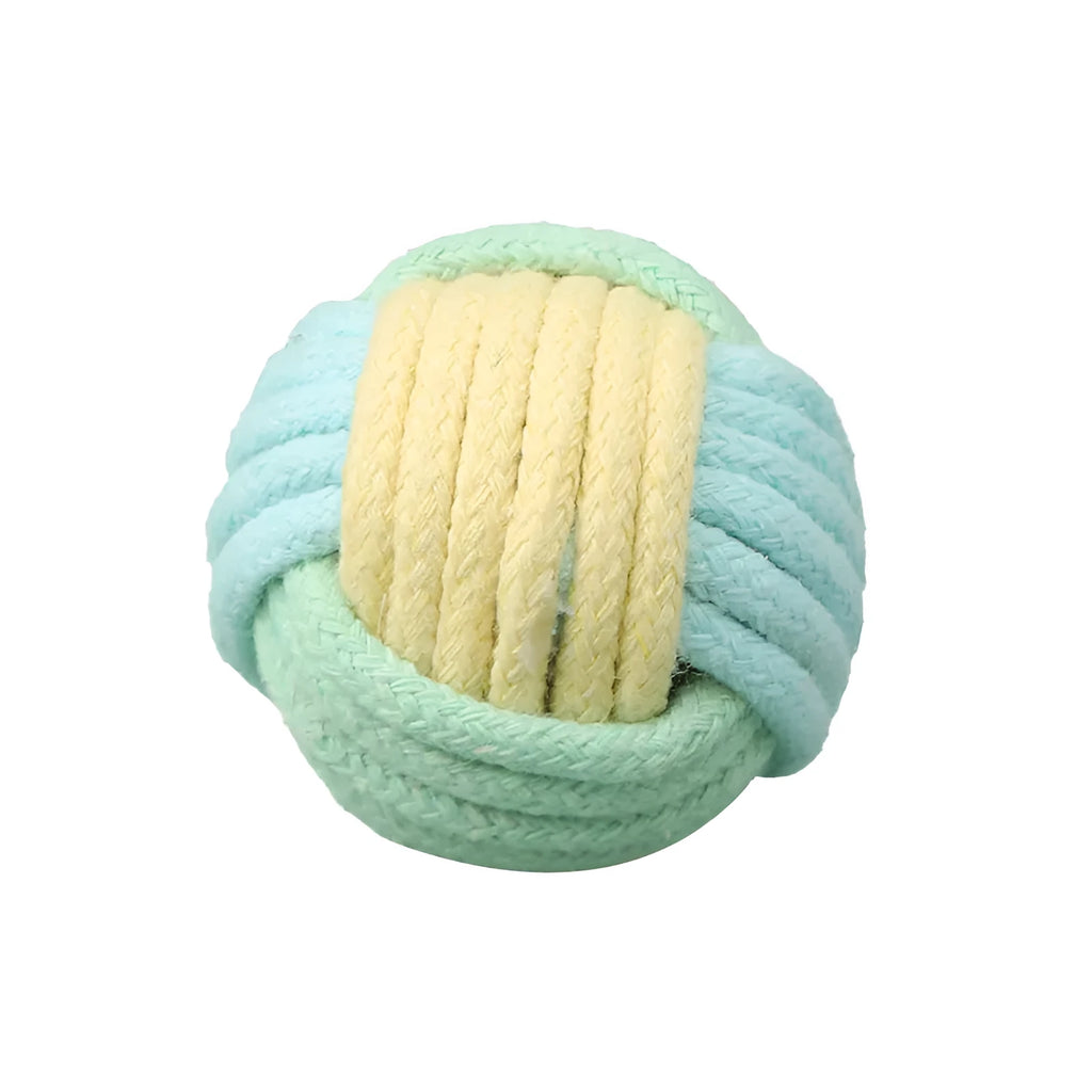 Handmade blue powder and green cotton plush ball cat toy for play and teeth grinding.