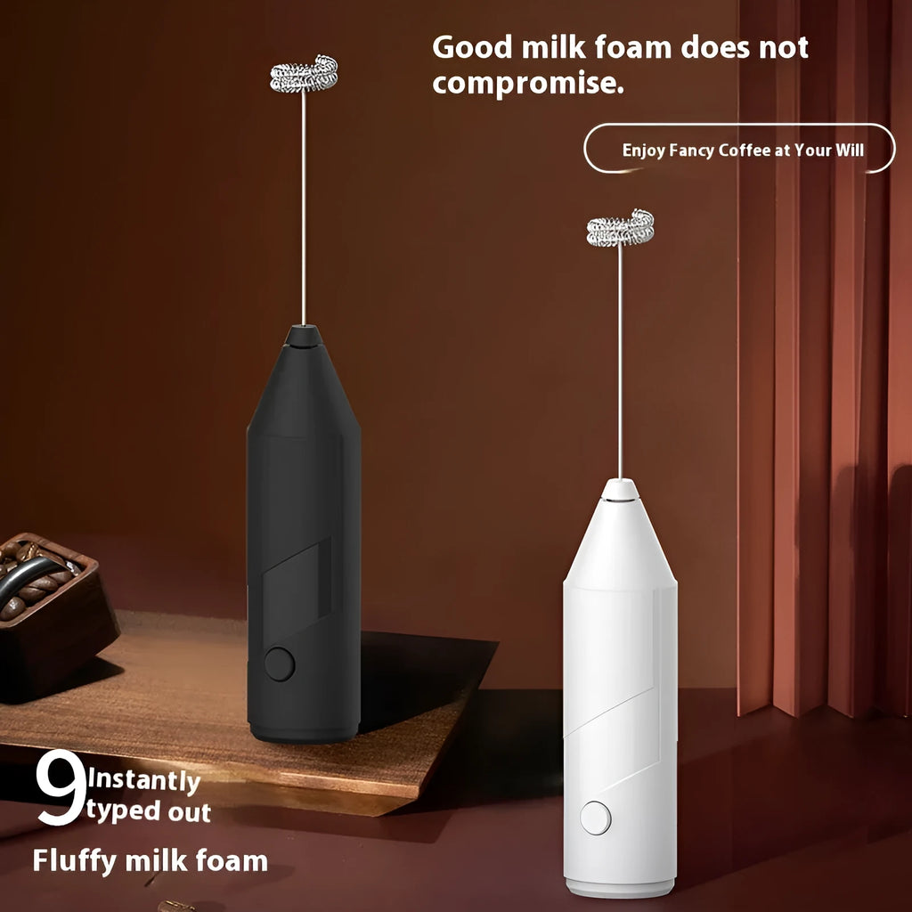 Mini handheld electric milk frother in black, white, or khaki with stainless steel whisk.