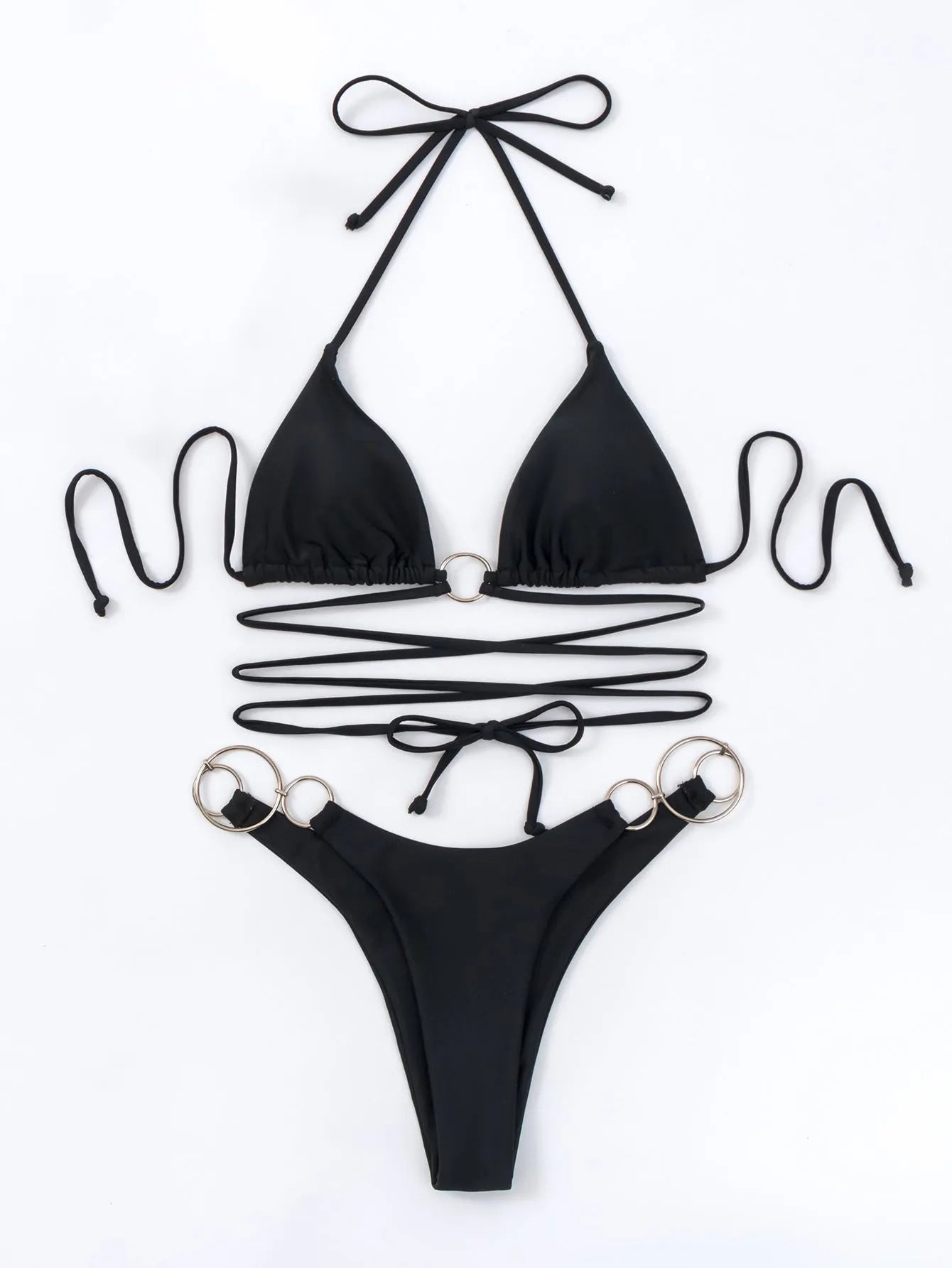 Women's black solid colour metal ring long strap split bikini swimsuit set on display, showing backless top and tie side bottom