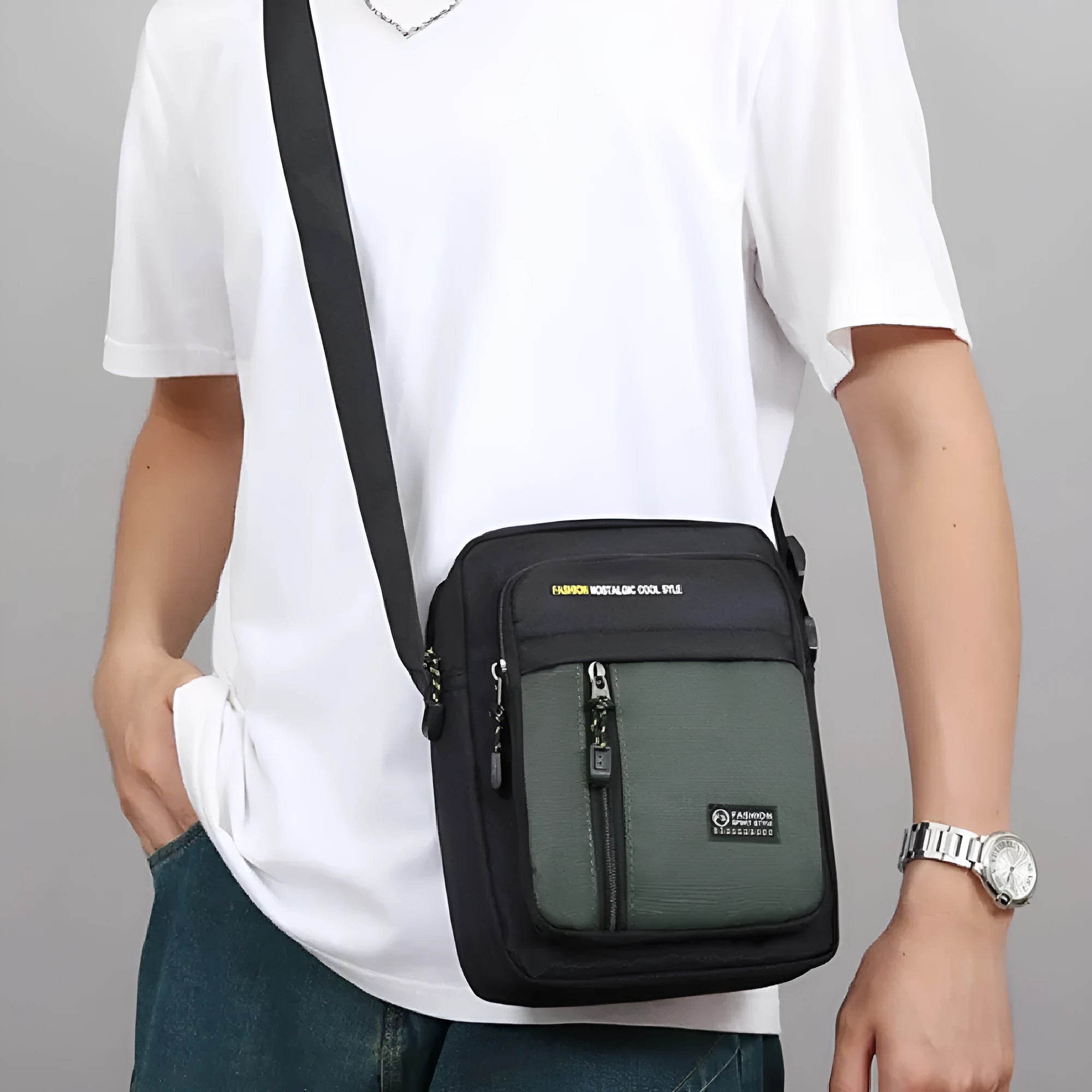 Men's nylon crossbody messenger bag in green showing shoulder strap and sewing thread detailing