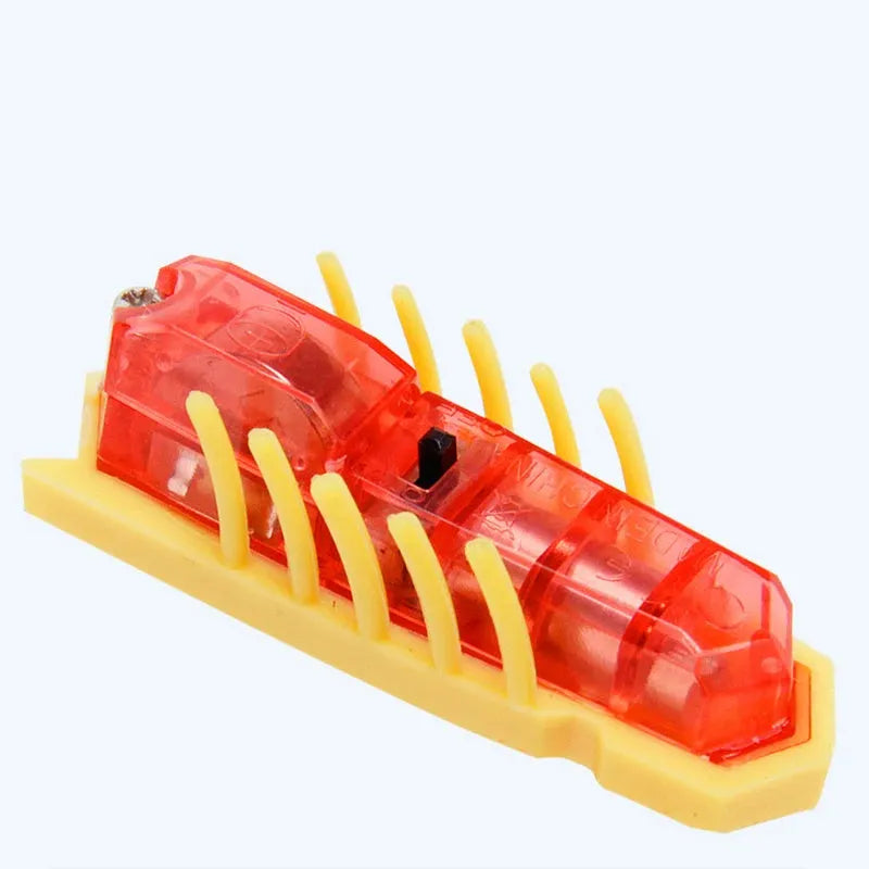 Mini electric bug toy for cats, ladybird style, crawling on a floor with green colour and PVC body