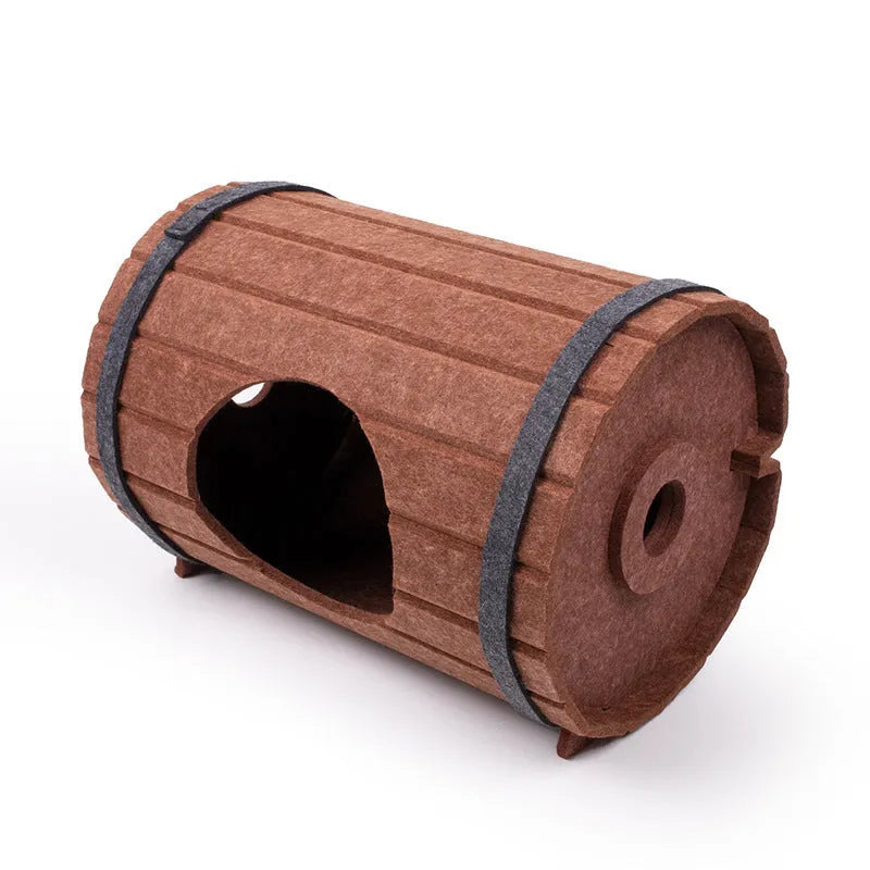 Assembled wine barrel pet bed in polyester fibre felt with binding straps, designed as a cosy cat nest
