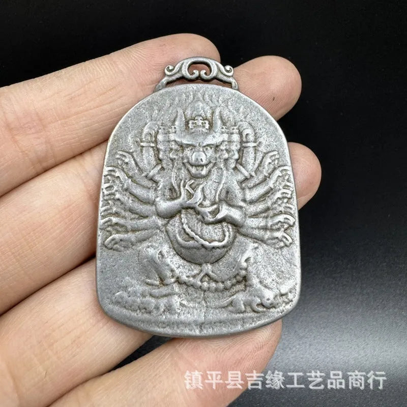 Iron metal pendant ornament with Chinese geometric style and Yamantaka deity depiction.