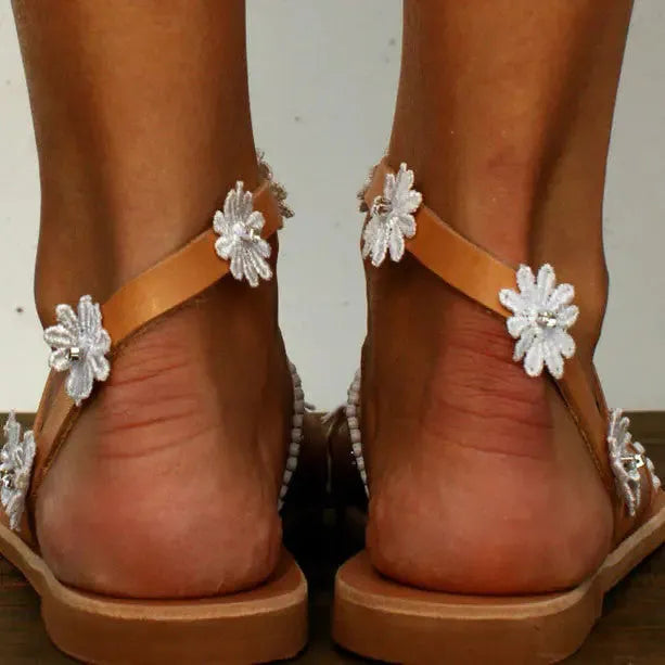 Brown floral pattern ladies Roman sandals with flat rubber sole and sleeve design