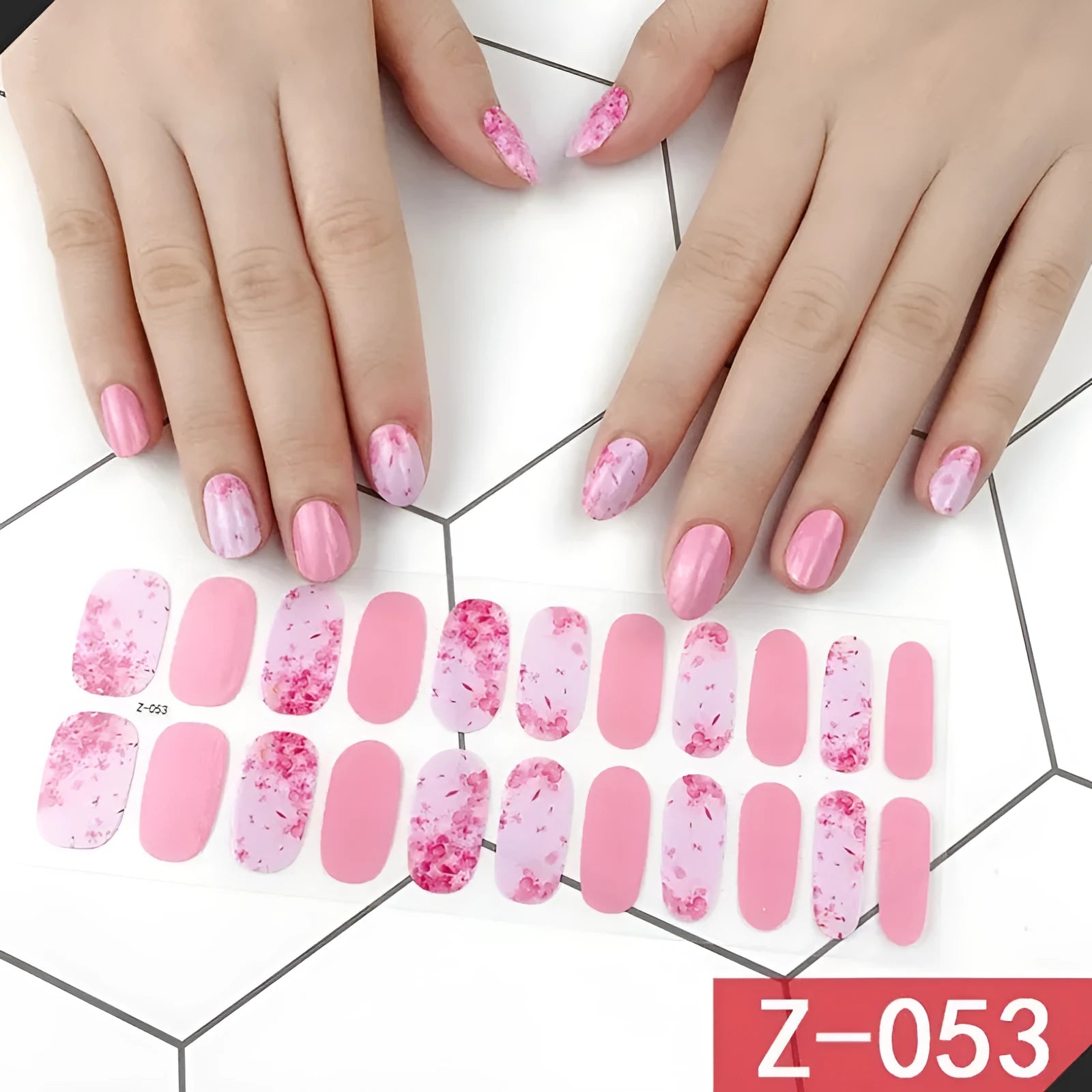 Korean nail stickers set with 22 pieces and nail file, showing cartoon, strawberry, flower, and embossed water drop patterns on nails