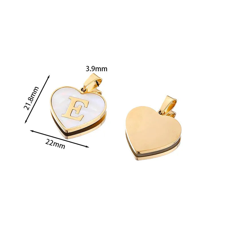 Gold heart-shaped white shell necklace with personalised letter charm on adjustable chain