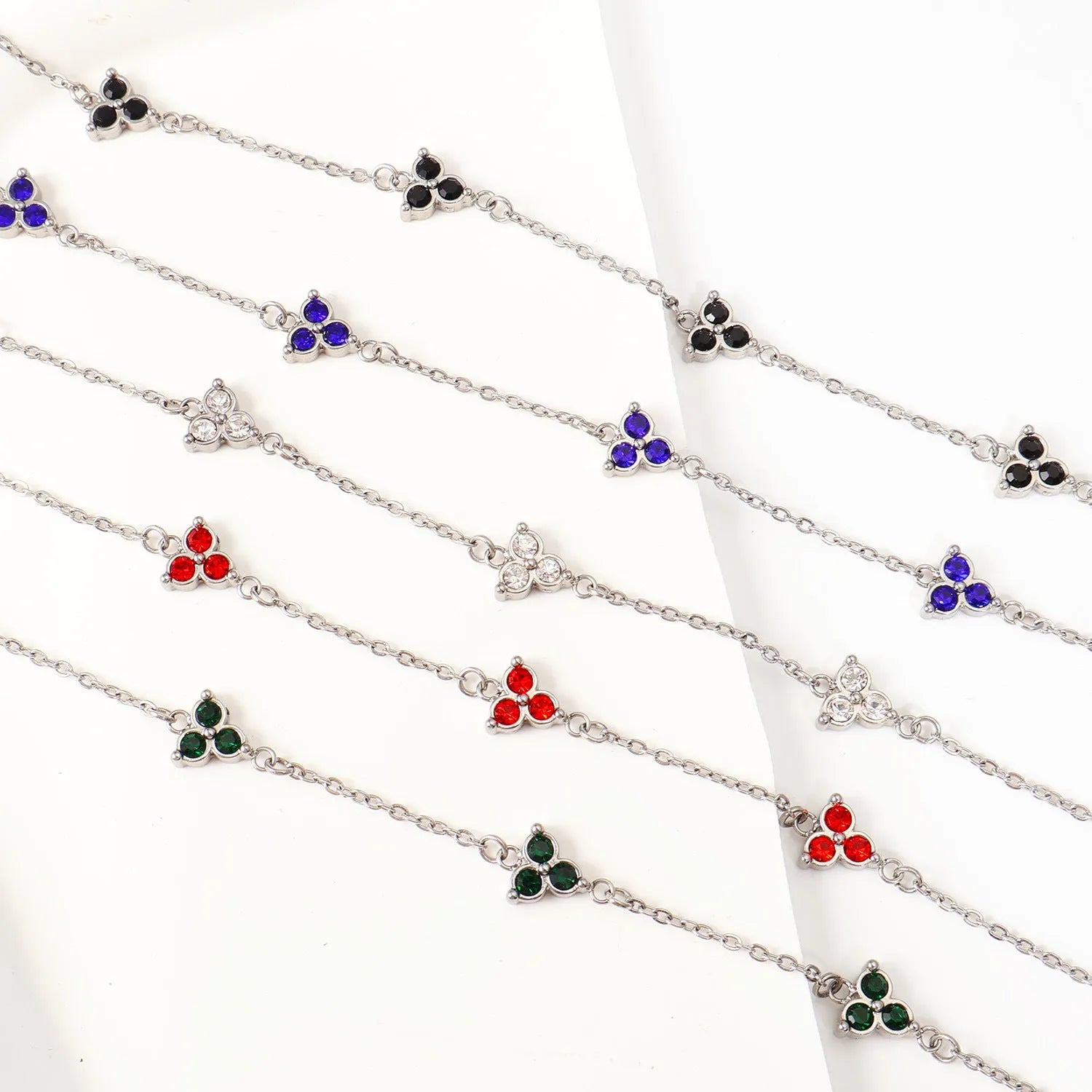 Women's stainless steel bracelet with three diamond geometry design and triangle elements