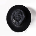 Handmade Halloween skull hat in wool felt and denim with conical crown shape