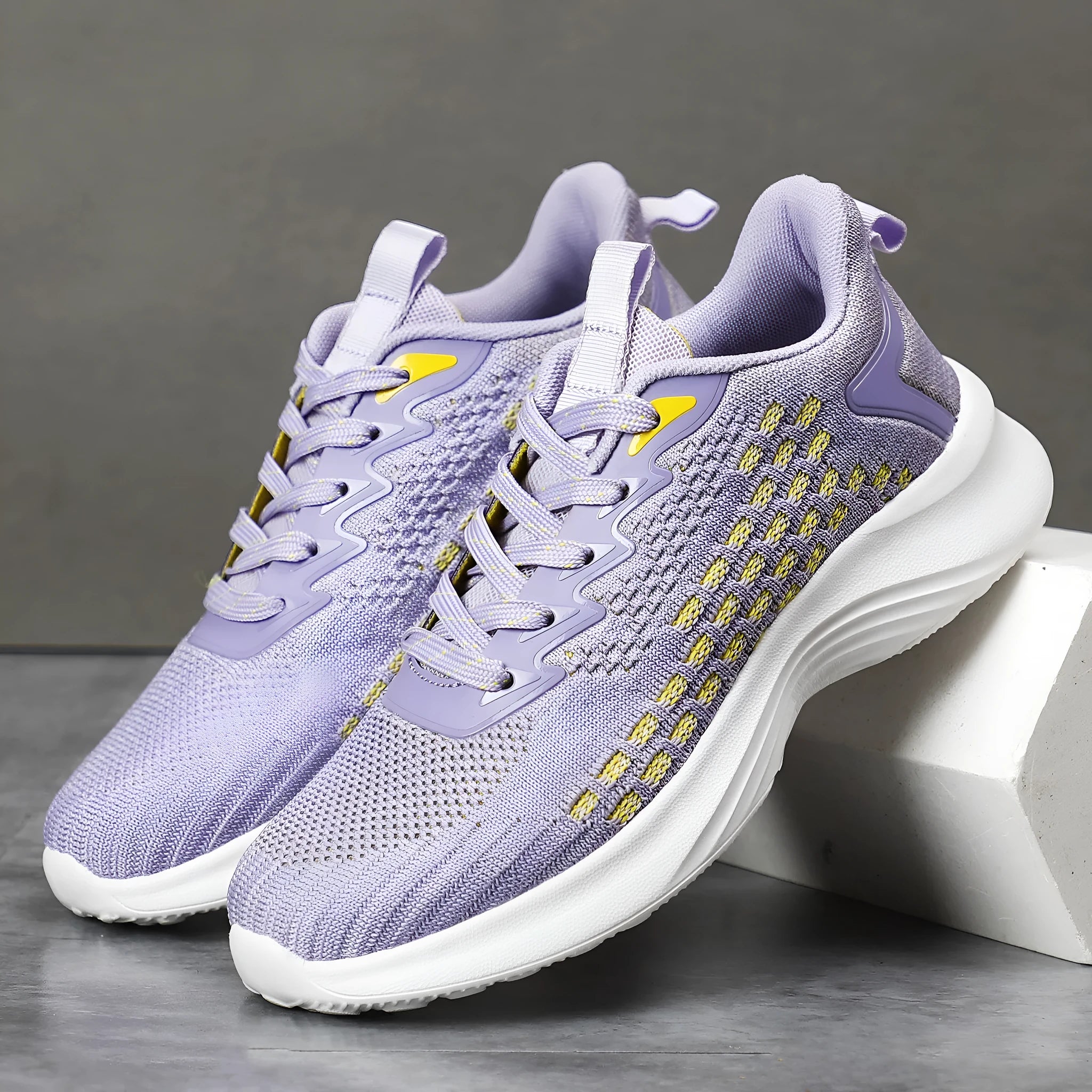 Women's lavender purple Flyknit mesh running shoes with striped pattern and EVA sole