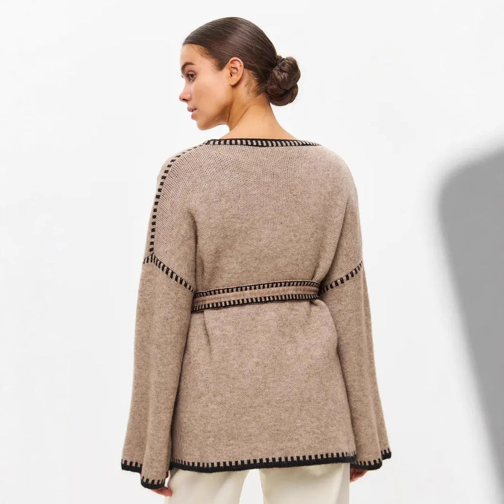 Lace-up front knitted cardigan in a loose fit, shown in black, camel, and white colour options.