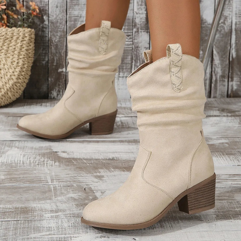Plus size women's suede mid-calf boot with mid heel on a white background.